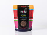 Load image into Gallery viewer, PAKTLI Extra Dark Chocolate With Dried Cranberries and Cashews Ancient Grain Puffs